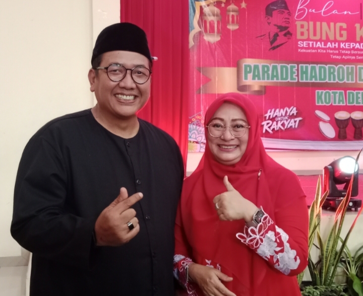 Ketua DPC PDI Perjuangan Kota Depok sekaligus Wakil Ketua DPRD Kota Depok, Hj. Yuni Indriany bersama Suami, H. Ade Hukmawan usai penutupan rangkaian Peringatan Bulan Bung Karno 2026 yang dirangkai dengan Parade Hadroh dan Marawis di Balai Rakyat Beji, Minggu (28/6/2026), bertepatan dengan momen ulang tahun ke-50 Hj. Yuni Indriany.