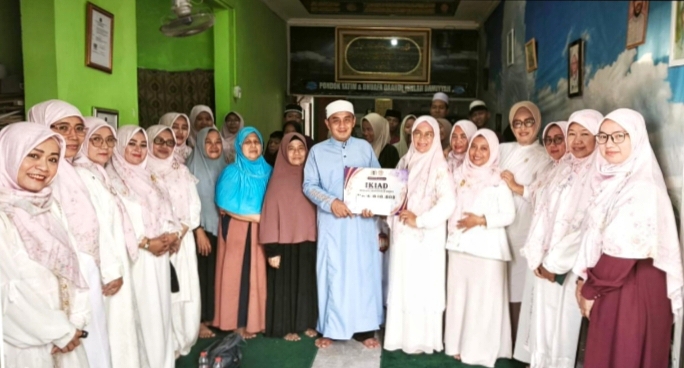 Ikatan Keluarga Istri Anggota DPRD (IKIAD) Kota Depok menggelar kegiatan santunan di Yayasan Irsyaadul Ummah, Tapos, pada Jumat (24/7/26).
