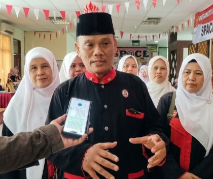 Ketua DKR Kota Depok, Roy Pangharapan